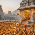 Book Shirdi aarti online — lamps and marigolds at the Sai Baba Samadhi Mandir at dawn