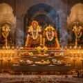 Shirdi Sai mantras chanted before a lamp-lit temple shrine during evening aarti worship