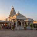 Shirdi VIP darshan queue outside the white-marble Samadhi Mandir at dawn
